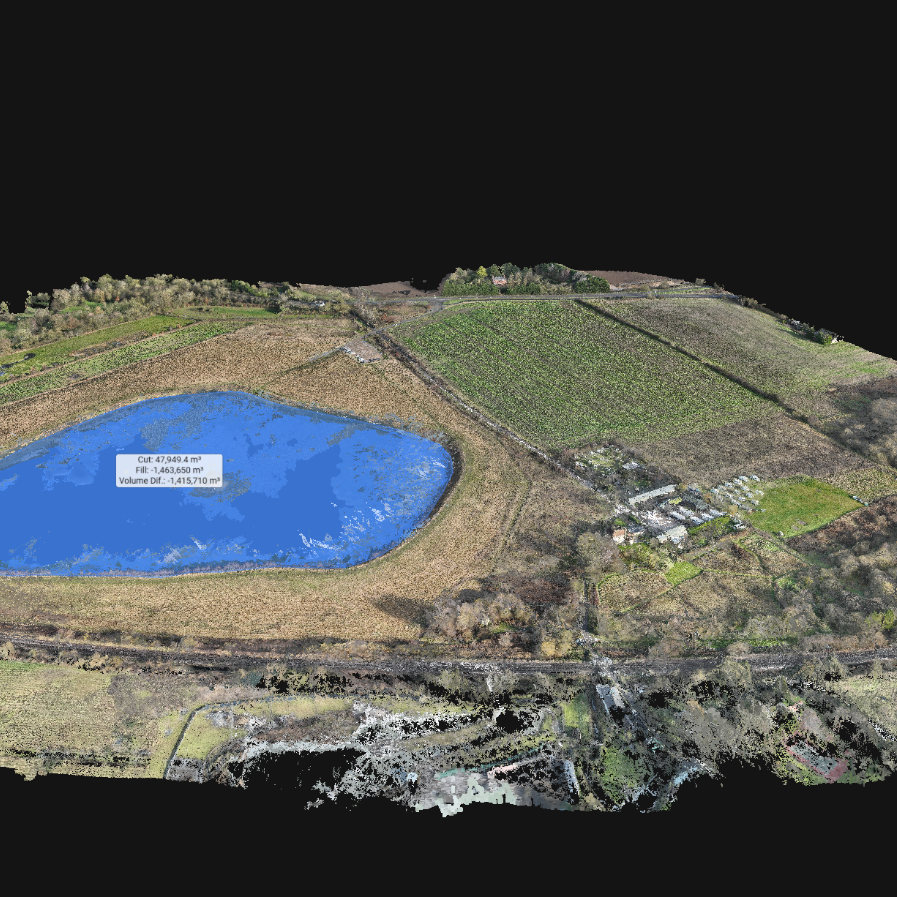 Dernford Aerial view of a landscape featuring a blue lake and surrounding agricultural fields.